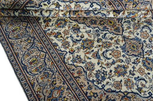 Close-up detail of 2000s Kashan rug from Iran / Persia showing Wool weave