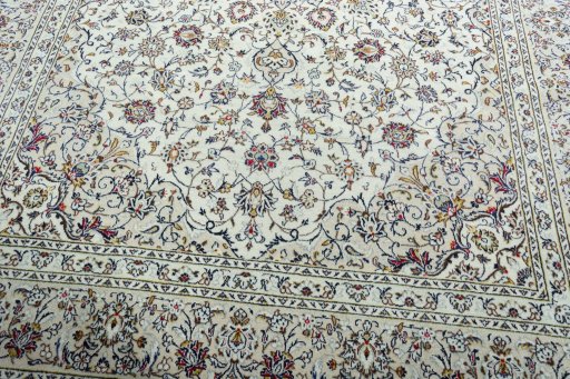 Close-up detail of 2000s Kashan rug from Iran / Persia showing Wool weave
