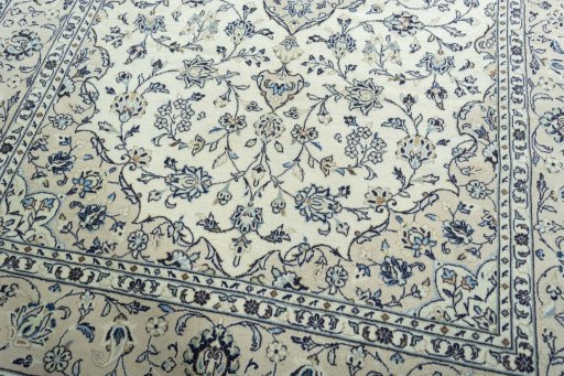 Close-up detail of 2000s Kashan rug from Iran / Persia showing Wool weave