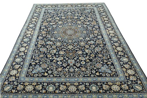 Surface texture of 2000s Kashan rug with natural Wool and intricate pattern