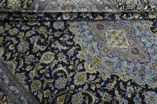 Close-up detail of 1970s Kashan rug from Iran / Persia showing Wool weave