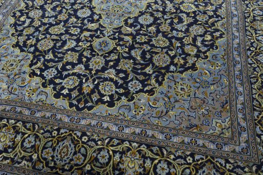 Close-up detail of 1970s Kashan rug from Iran / Persia showing Wool weave
