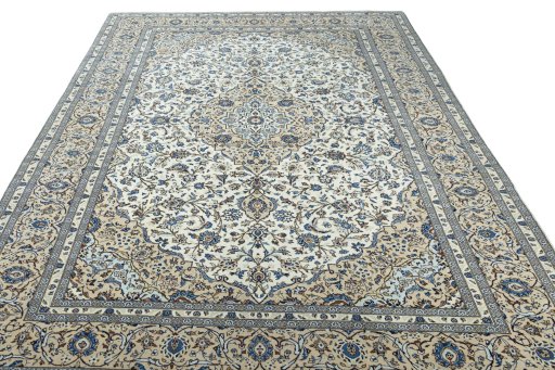 Surface texture of 2000s Kashan rug with natural Wool and intricate pattern