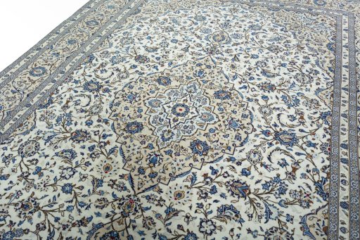 Backside of handmade 2000s Kashan rug showing knot structure and weave density