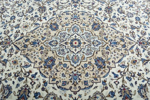 Central medallion detail of 2000s Kashan rug from Iran / Persia
