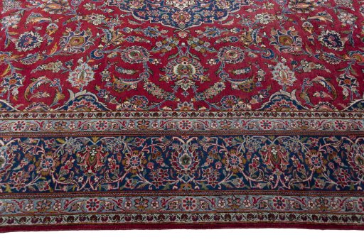 Corner detail of 1950s Kashan rug showing border pattern and Wool pile
