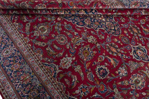 Close-up detail of 1950s Kashan rug from Iran / Persia showing Wool weave