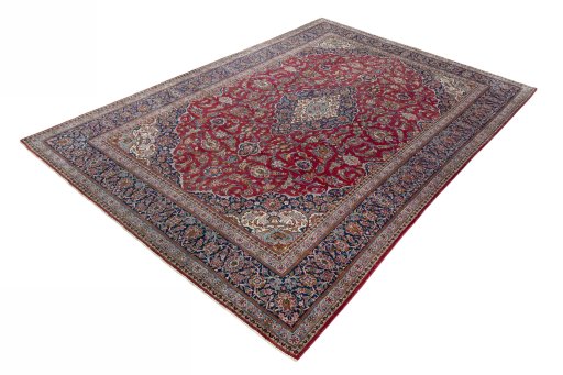 Corner detail of 1950s Kashan rug showing border pattern and Wool pile