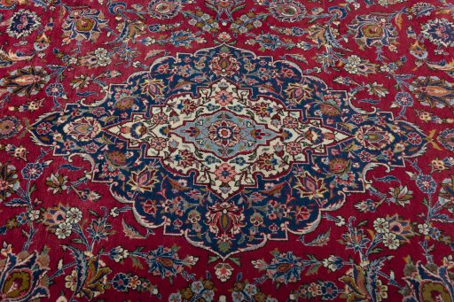 Central medallion detail of 1950s Kashan rug from Iran / Persia