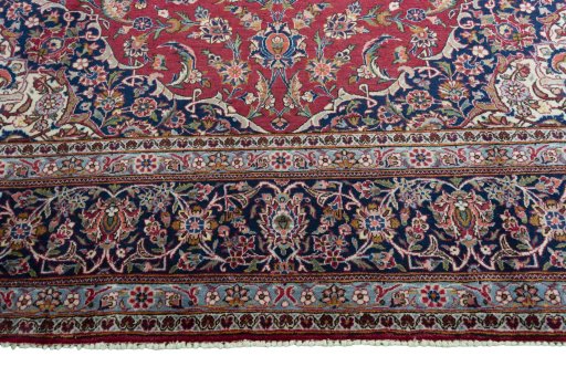 Full view of 1950s Kashan rug from Iran / Persia, 366 × 243 cm in Red tones
