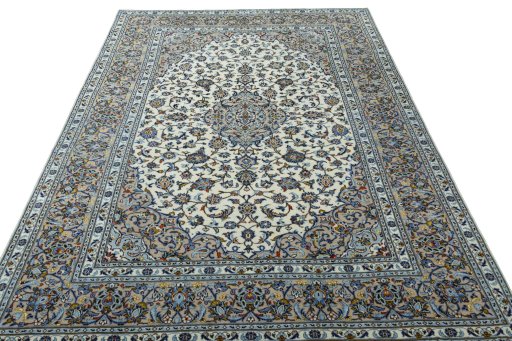 Surface texture of 2000s Kashan rug with natural Wool and intricate pattern