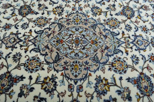 Central medallion detail of 2000s Kashan rug from Iran / Persia