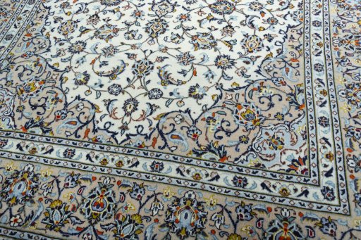 Close-up detail of 2000s Kashan rug from Iran / Persia showing Wool weave