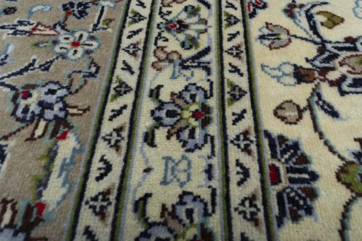Central medallion detail of 2000s Kashan rug from Iran / Persia
