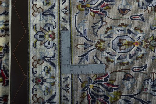 Close-up detail of 2000s Kashan rug from Iran / Persia showing Wool weave