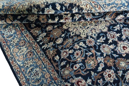Close-up detail of 1970s Kashan rug from Iran / Persia showing Wool weave