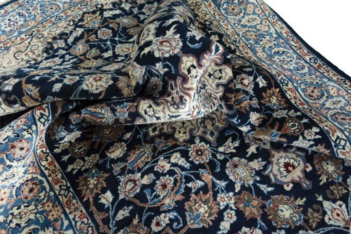Surface texture of 1970s Kashan rug with natural Wool and intricate pattern