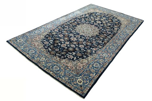 Corner detail of 1970s Kashan rug showing border pattern and Wool pile