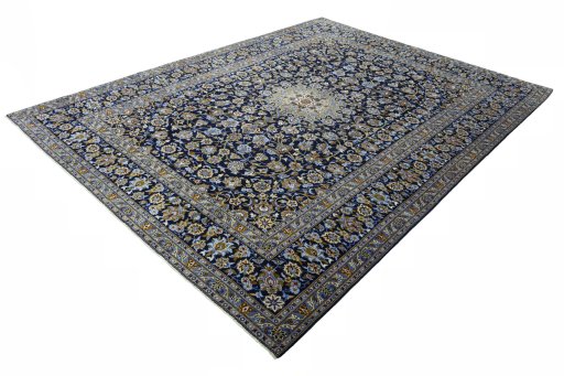 Corner detail of 2000s Kashan rug showing border pattern and Wool pile