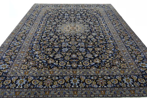 Surface texture of 2000s Kashan rug with natural Wool and intricate pattern