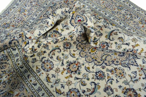 Surface texture of 2000s Kashan rug with natural Wool and intricate pattern