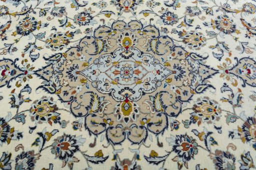 Central medallion detail of 2000s Kashan rug from Iran / Persia