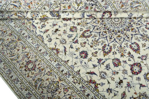 Close-up detail of 2000s Kashan rug from Iran / Persia showing Wool weave