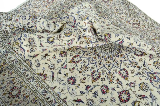 Surface texture of 2000s Kashan rug with natural Wool and intricate pattern