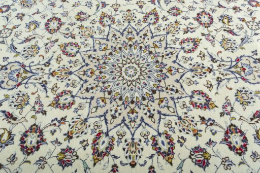 Central medallion detail of 2000s Kashan rug from Iran / Persia