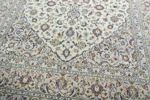 Close-up detail of 2000s Kashan rug from Iran / Persia showing Wool weave