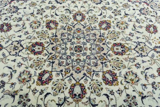 Central medallion detail of 2000s Kashan rug from Iran / Persia