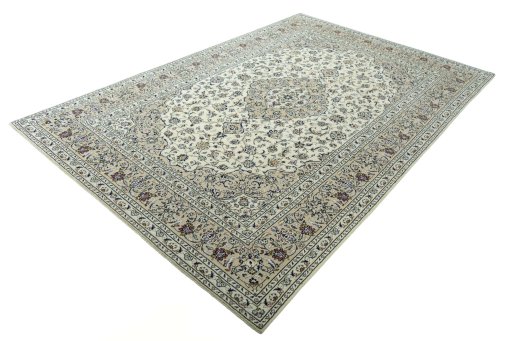 Corner detail of 2000s Kashan rug showing border pattern and Wool pile