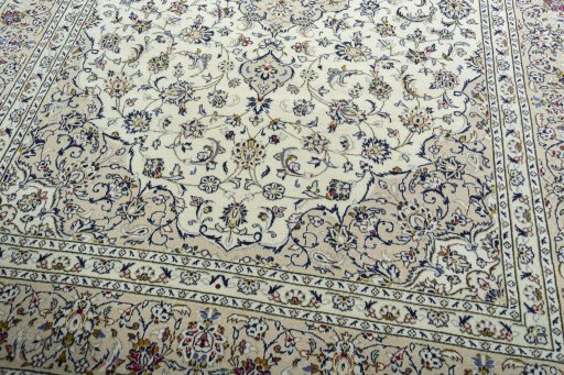 Close-up detail of 2000s Kashan rug from Iran / Persia showing Wool weave