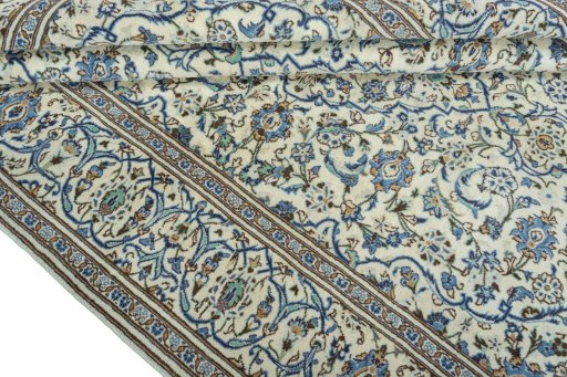 Close-up detail of 2000s Kashan rug from Iran / Persia showing Wool weave