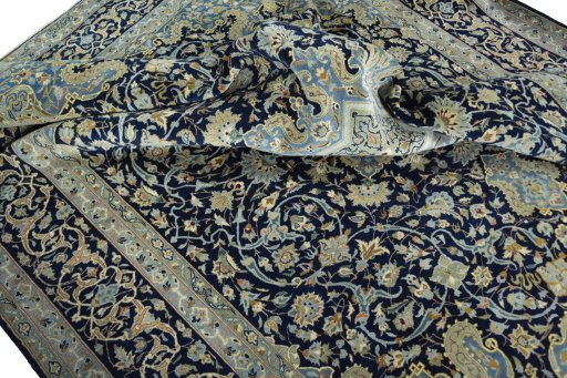Surface texture of 2000s Kashan rug with natural Cork and intricate pattern