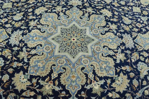 Central medallion detail of 2000s Kashan rug from Iran / Persia