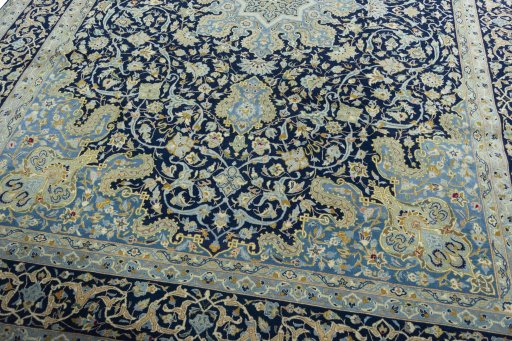 Close-up detail of 2000s Kashan rug from Iran / Persia showing Cork weave