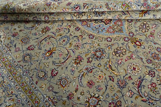Close-up detail of 2000s Kashan rug from Iran / Persia showing Wool weave
