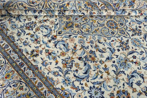 Close-up detail of 2000s Kashan rug from Iran / Persia showing Wool weave