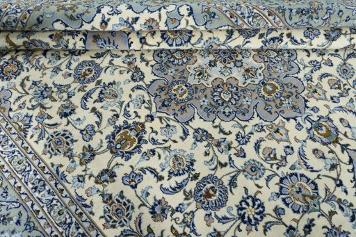 Close-up detail of 2000s Kashan rug from Iran / Persia showing Wool weave