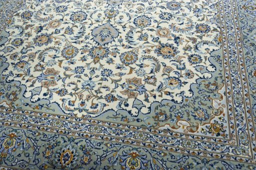 Close-up detail of 2000s Kashan rug from Iran / Persia showing Wool weave