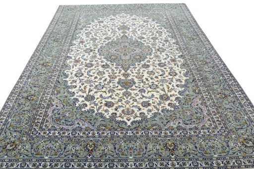 Surface texture of 2000s Kashan rug with natural Wool and intricate pattern