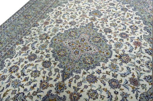 Backside of handmade 2000s Kashan rug showing knot structure and weave density