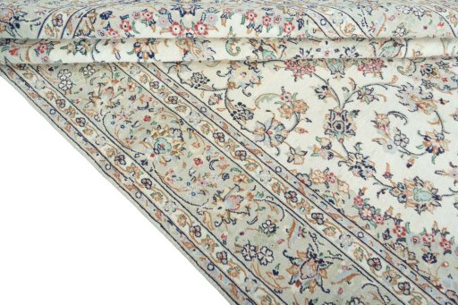 Close-up detail of 2000s Kashan rug from Iran / Persia showing Wool weave