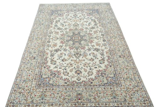 Surface texture of 2000s Kashan rug with natural Wool and intricate pattern
