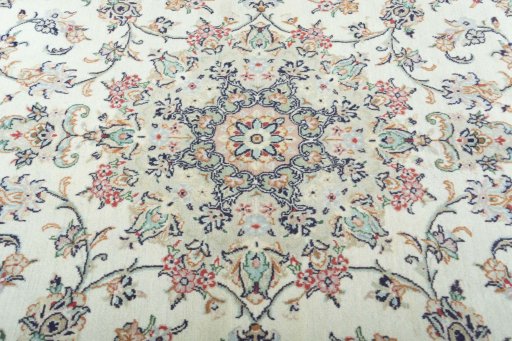 Central medallion detail of 2000s Kashan rug from Iran / Persia