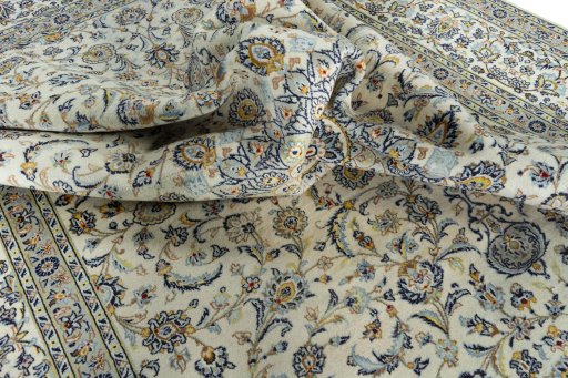 Surface texture of 2000s Kashan rug with natural Wool and intricate pattern