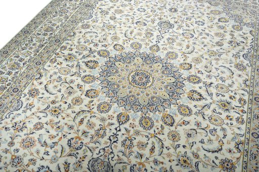 Backside of handmade 2000s Kashan rug showing knot structure and weave density
