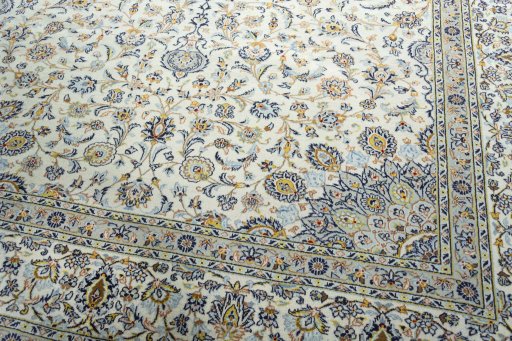 Close-up detail of 2000s Kashan rug from Iran / Persia showing Wool weave
