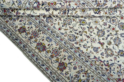 Close-up detail of 2000s Kashan rug from Iran / Persia showing Wool weave